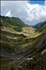 Curved mountain road passing through former glacier valley